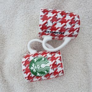 STARBUCKS COFFEE MUGS 12 OZ RED AND WHITE STRIPE SET OF 2